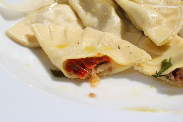 recipe for ravioli with dried tomatoes, serrano ham and buffalo mozzarella fresh , home-made ravioli